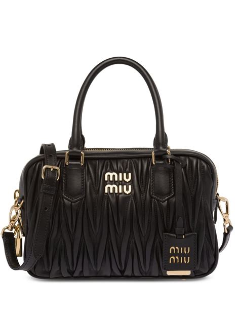 miu miu distressed leather bag|farfetch miumiou bags.